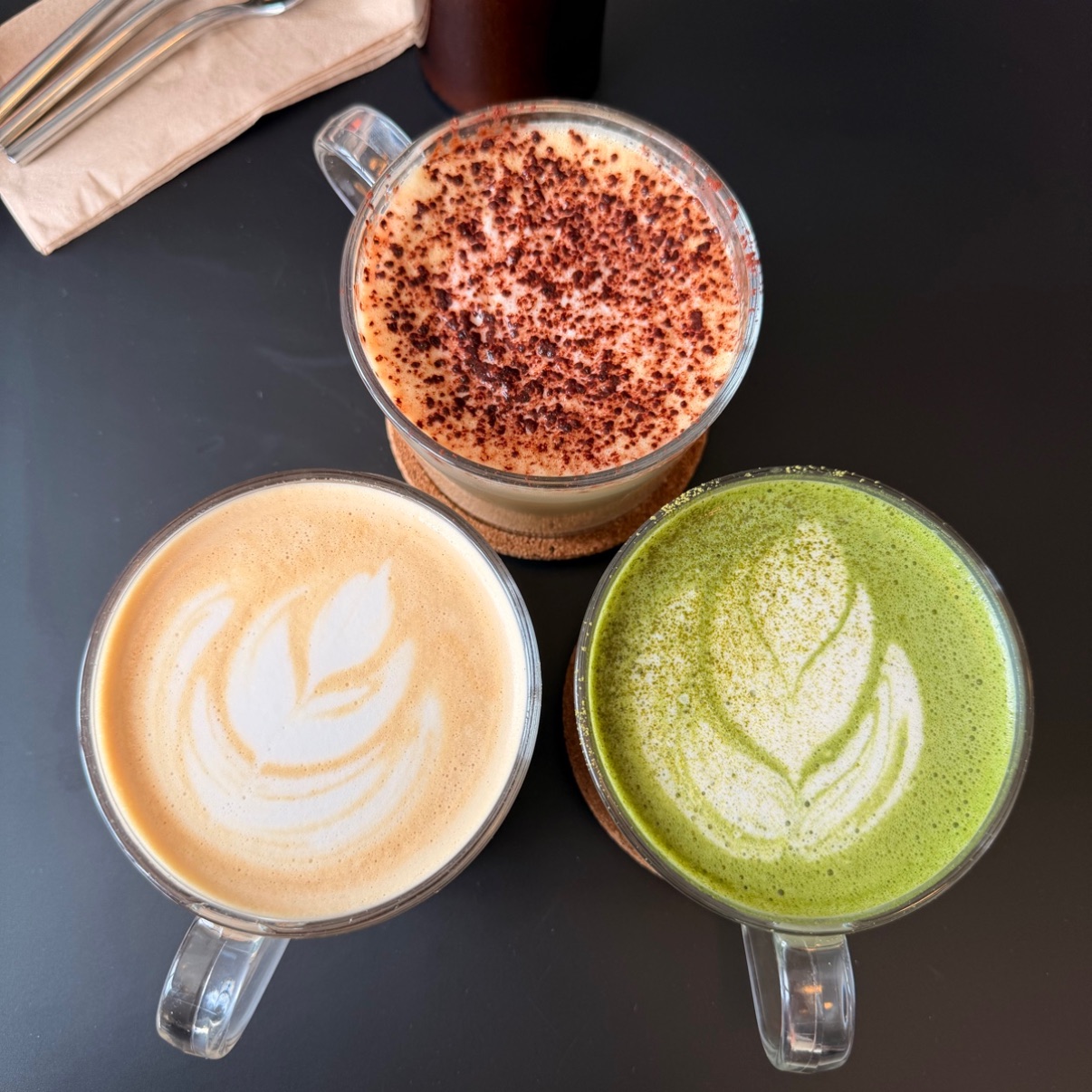 Latte, mocha and matcha latte from above