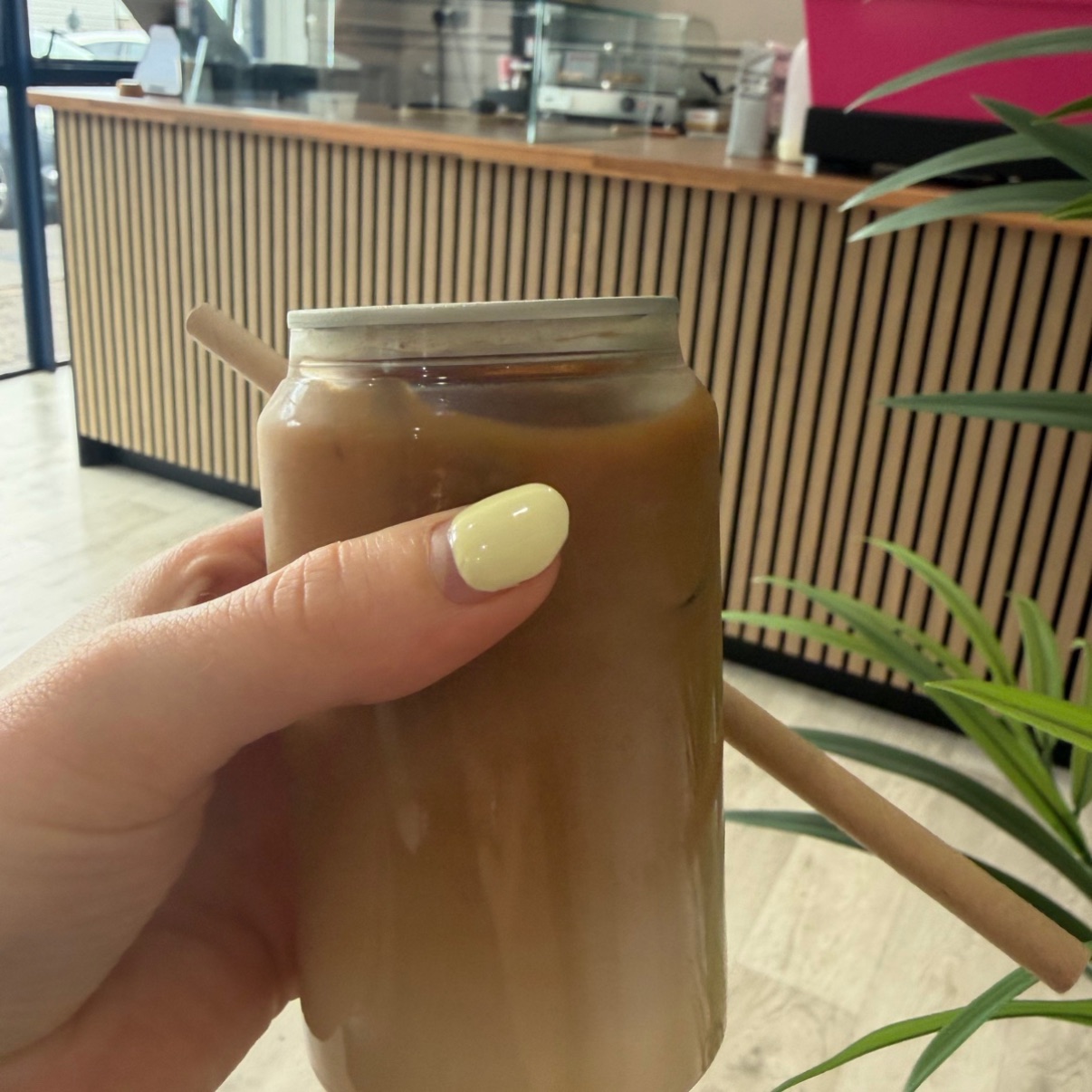 Iced flat white in a glass jar